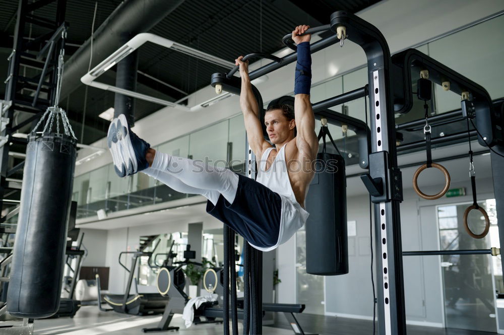 Similar – Image, Stock Photo Women training chins in gym in back image