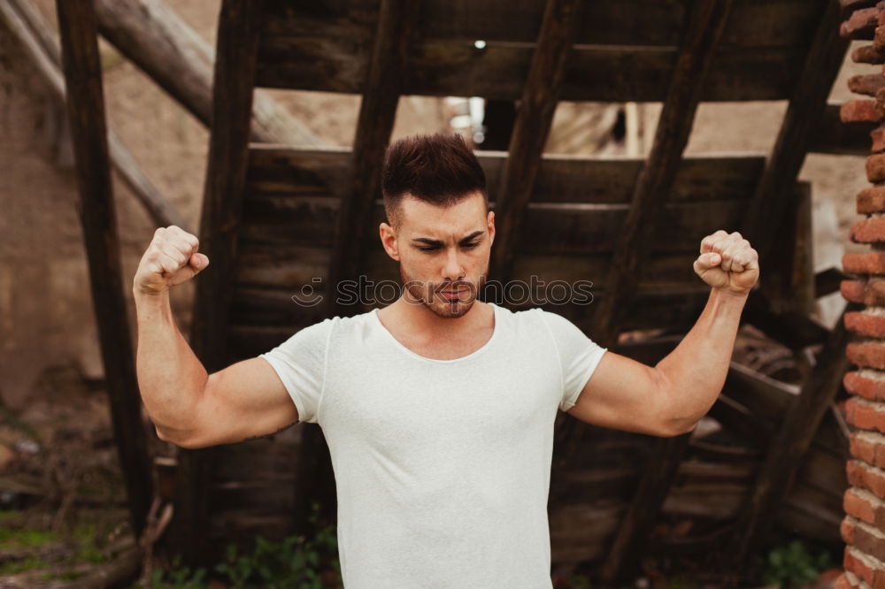 Similar – Image, Stock Photo Man leans against the wall and looks into the distance