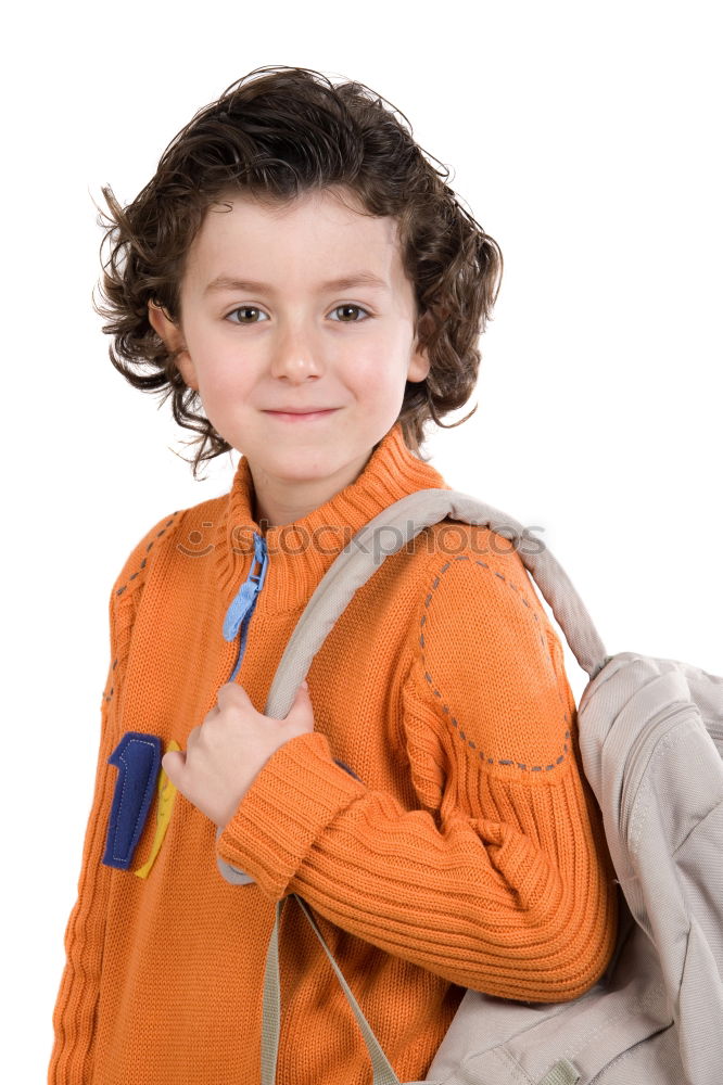 Similar – Cheerful child standing with his backpack on the floor