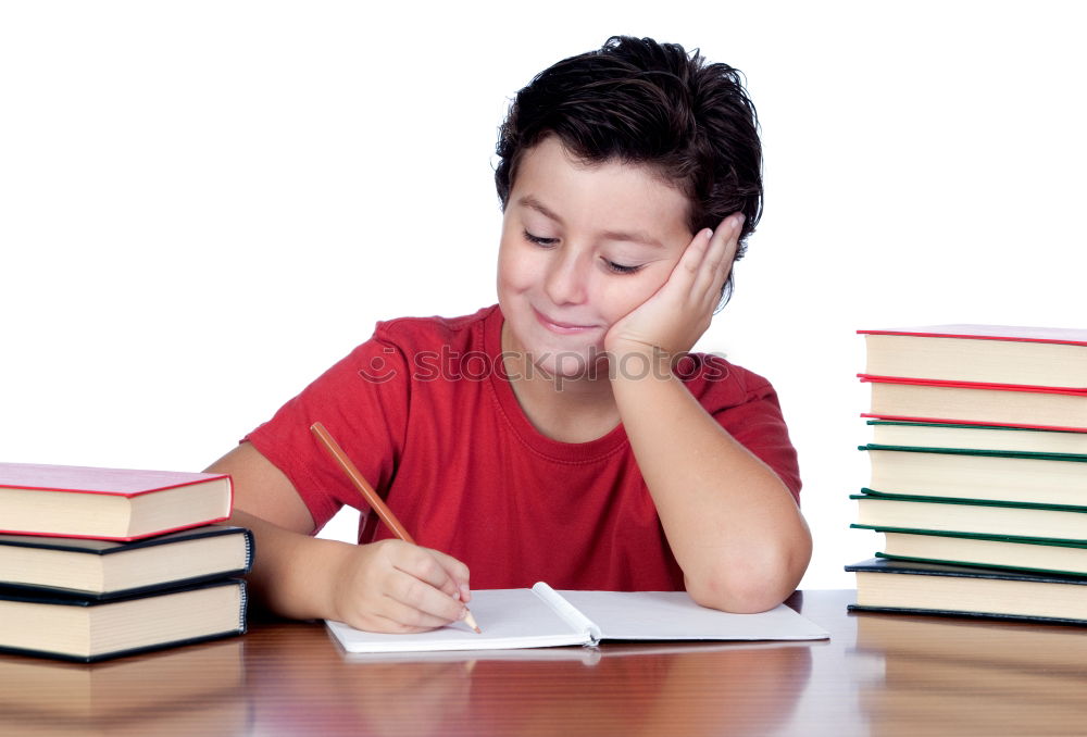 Similar – Young boy thinking about his homework