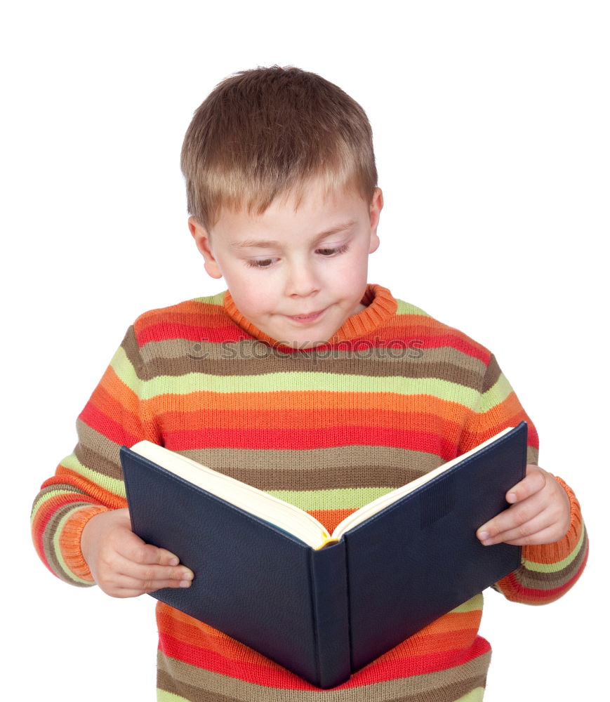 Similar – boy reading books on gray background