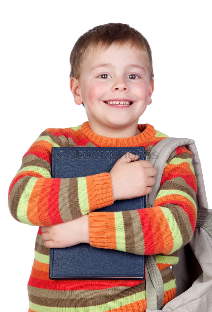 Similar – Cheerful child standing with his backpack on the floor