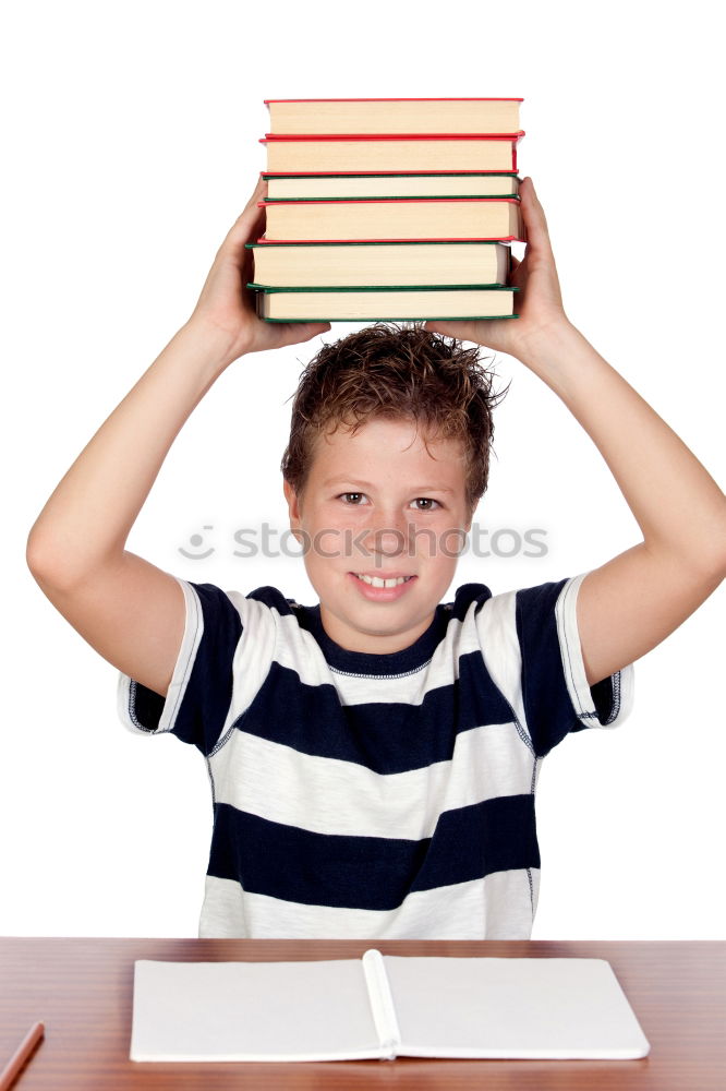 Similar – Young boy thinking about his homework