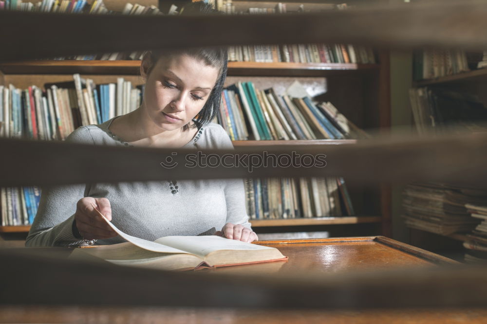 Similar – Student girl in a library