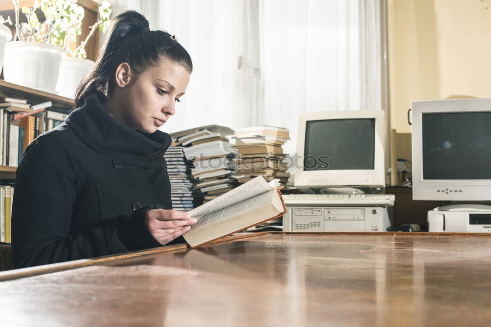 Similar – Student girl in a library