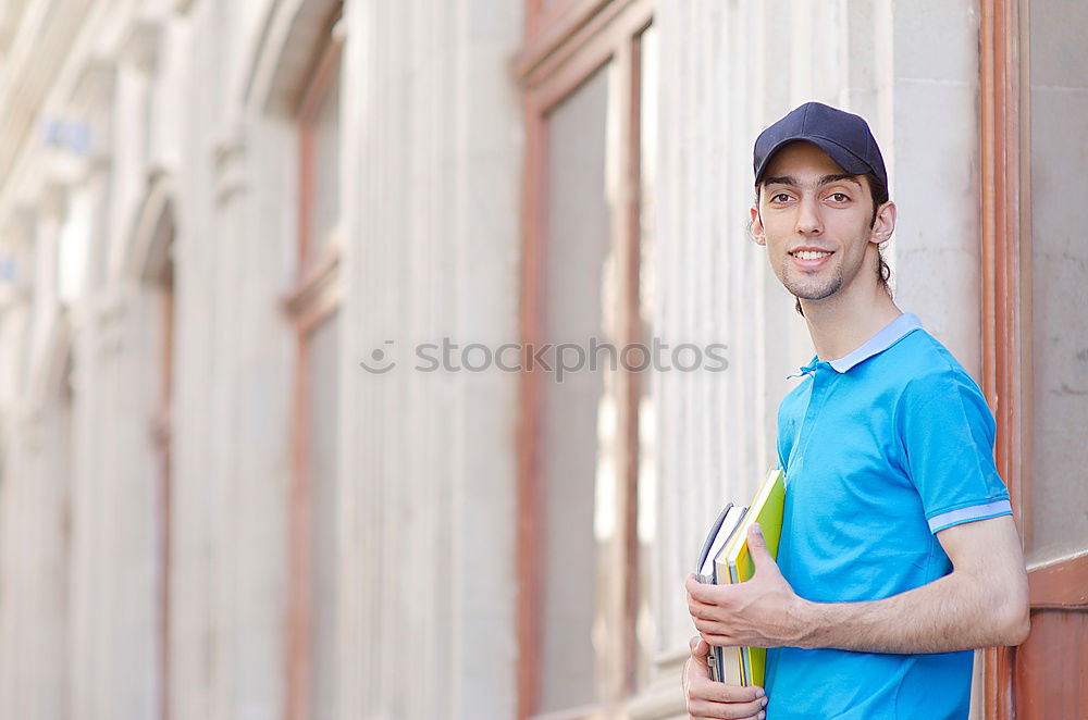 Similar – Image, Stock Photo Young man in sportswear leaning on metal fence and posing on sta