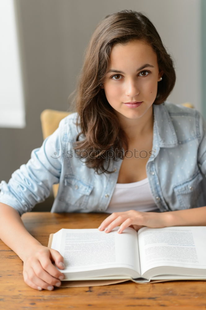Similar – Image, Stock Photo young woman lying in bed reading a book