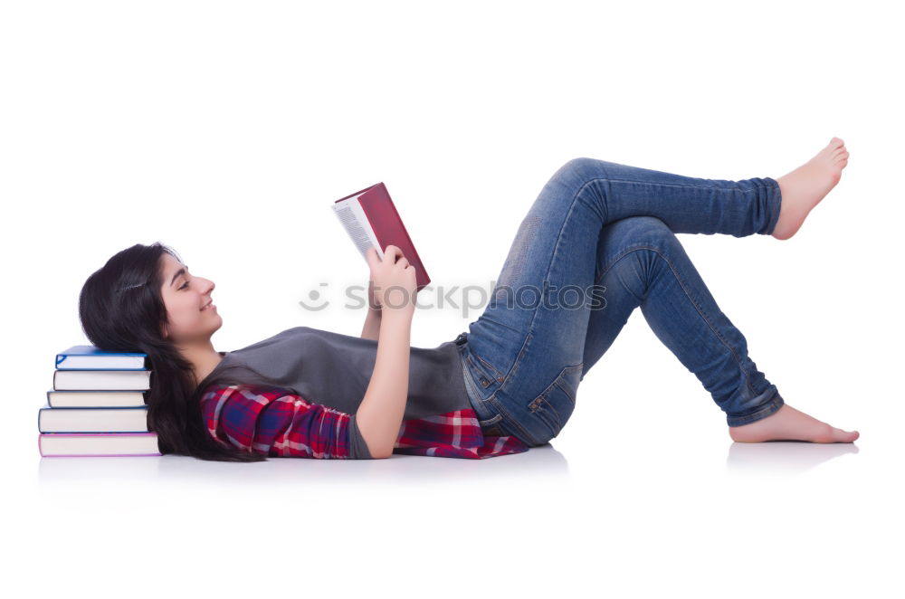 Similar – Image, Stock Photo Schoolgirl reading a book in classroom