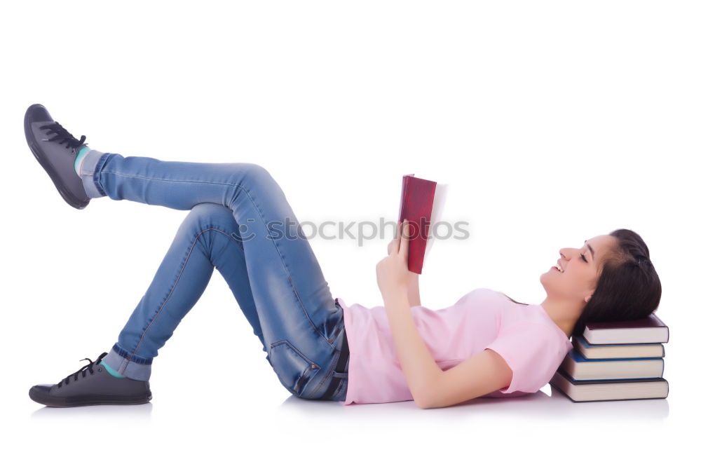 Similar – Image, Stock Photo Schoolgirl reading a book in classroom