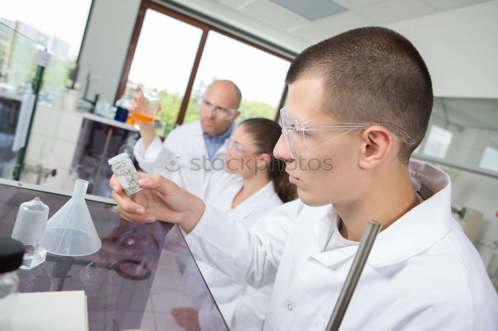 Similar – Image, Stock Photo Young man in lab