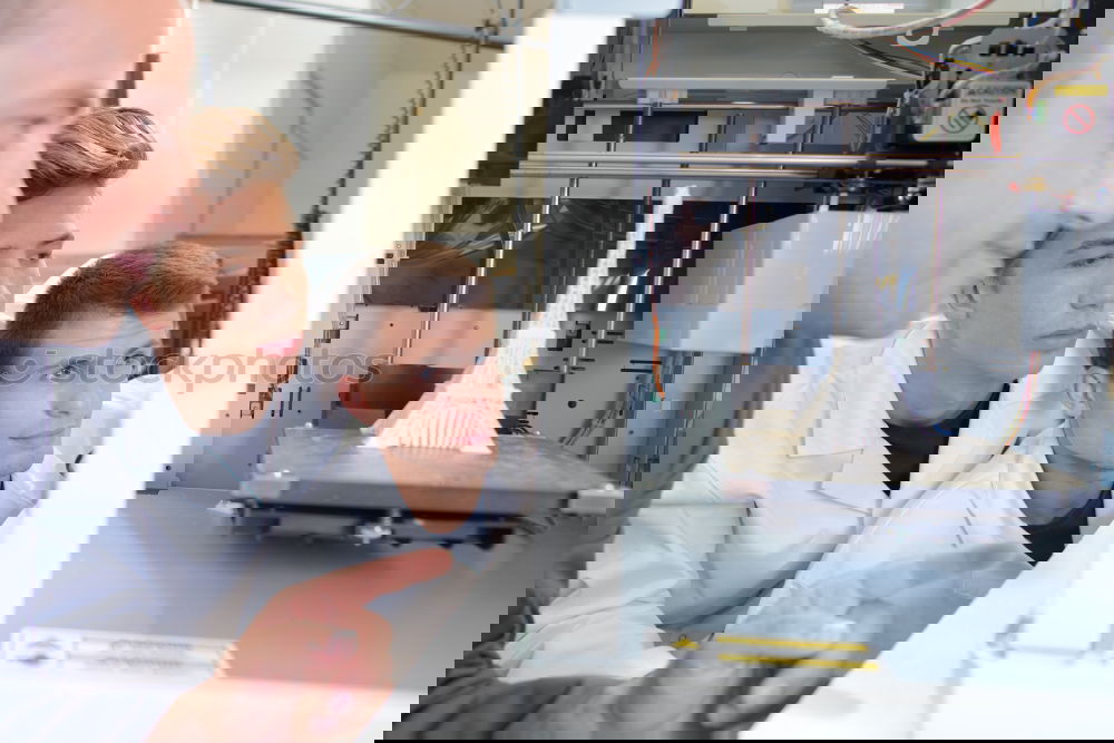 Similar – Image, Stock Photo Workers communicating in lab