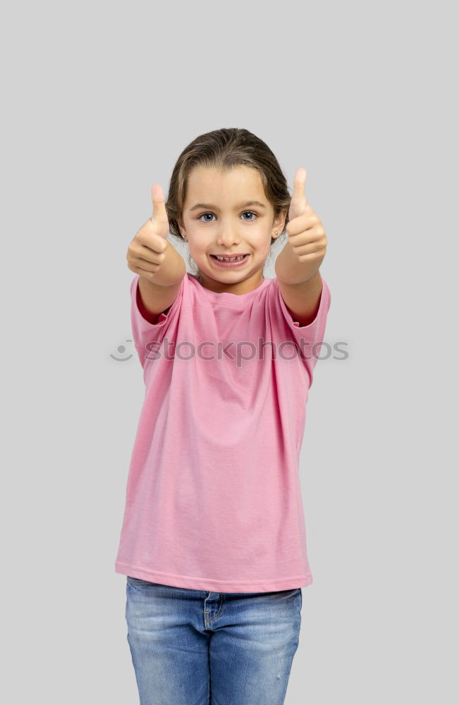 Similar – A kid holding a happy emoticon face