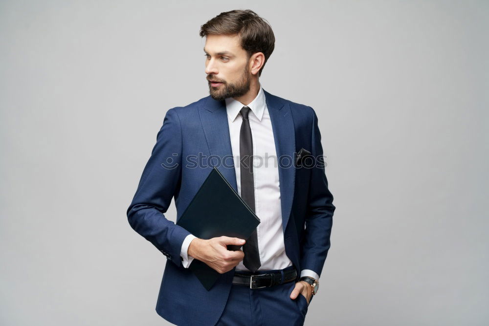 Similar – Image, Stock Photo Bearded man in urban background wearing british elegant suit