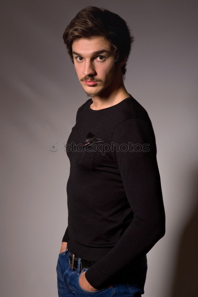 Similar – Image, Stock Photo Young pensive man near fire stairs
