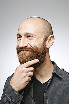 Similar – Young bald guy on black background