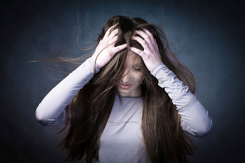 Similar – Portrait of a beautiful girl with big blue eyes looking at camera with surprised expression