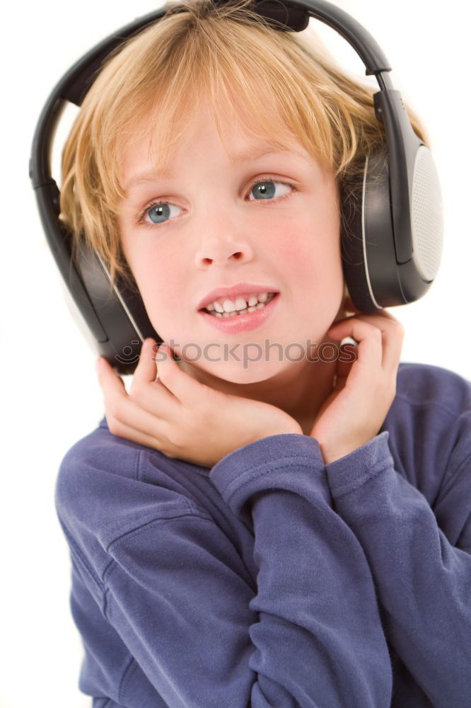 Similar – little boy with headphones