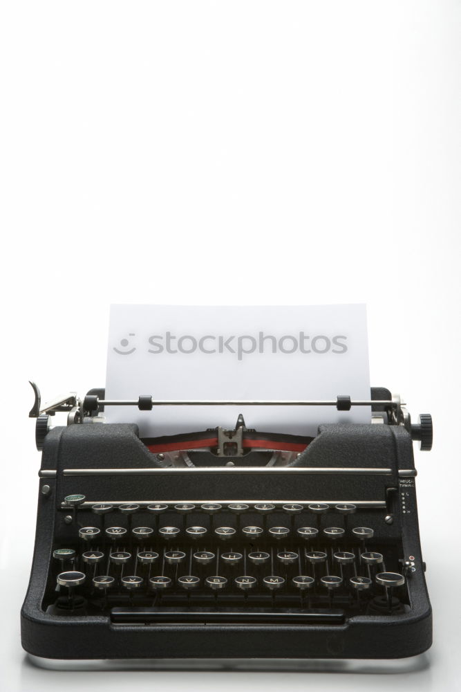 Similar – Red vintage typewriter with blank paper sheet on table