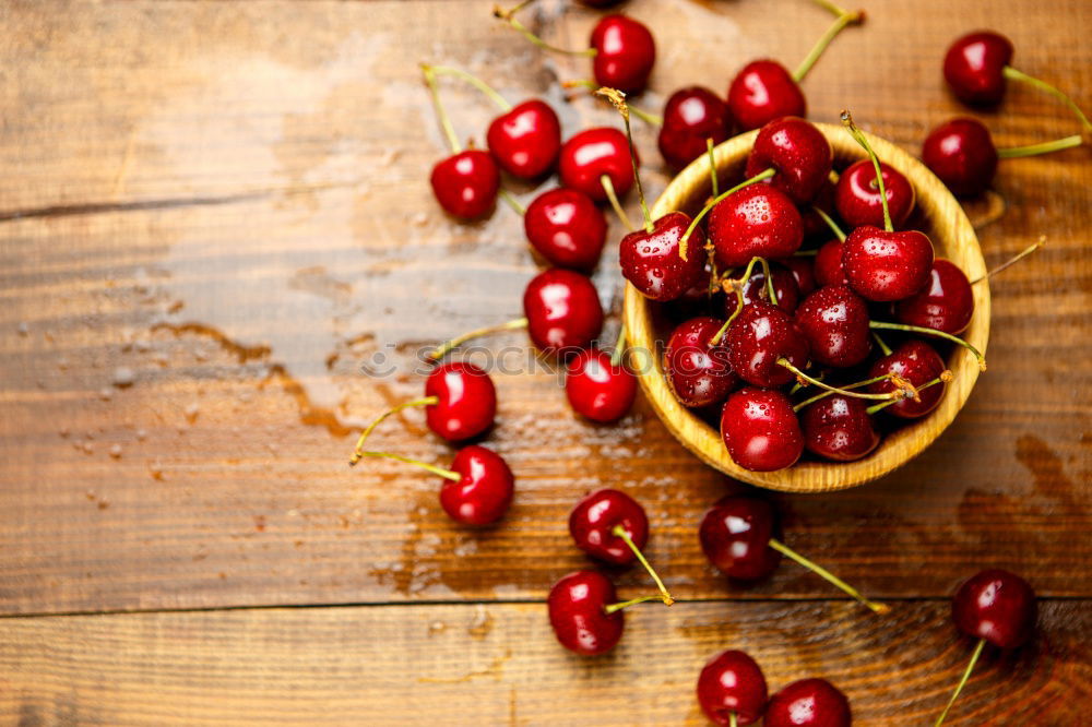 Similar – Image, Stock Photo Ripe red cherry in a paper bag