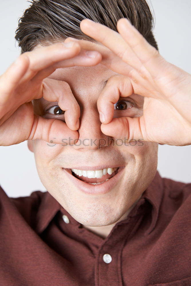 Similar – Image, Stock Photo Woman with monkey mask holding her hand in front of her face