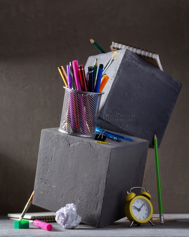 Similar – Notebooks pencils and school bag on a desktop