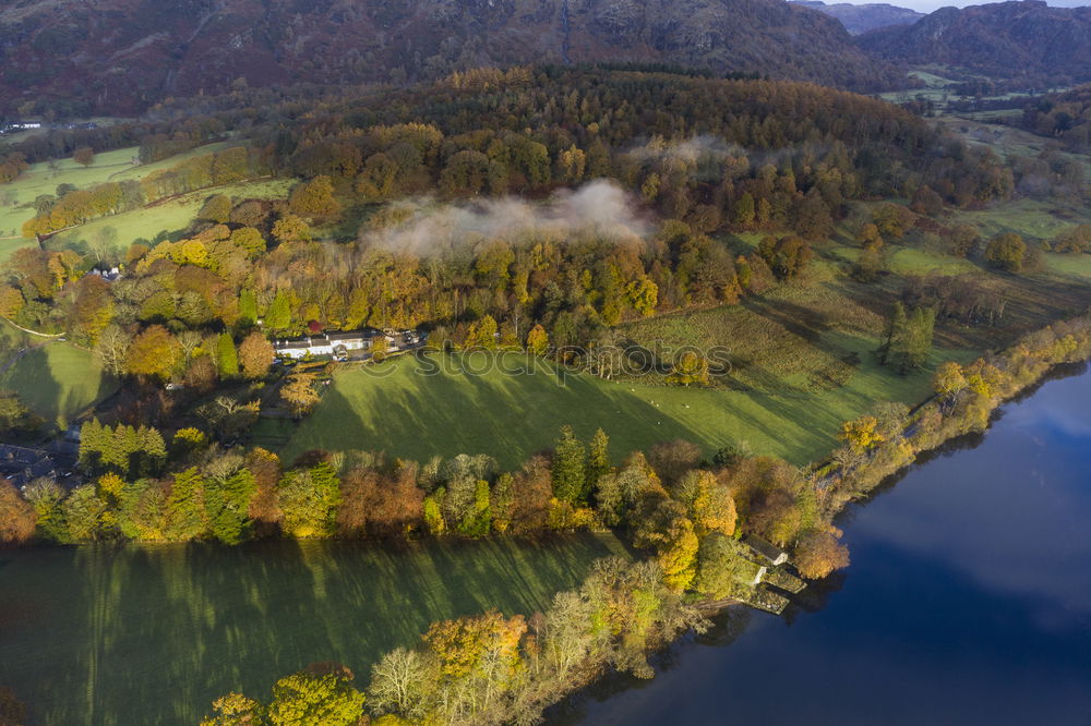 Similar – Sunny autumn day on the lake in mountains of south Austria