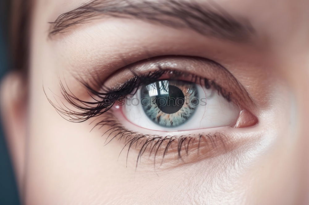 Similar – Young woman’s eye. Woman with blue eyes.