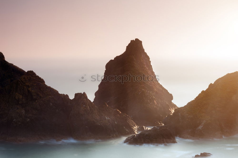 Similar – Image, Stock Photo Big chunk. Huge rock lies in the Pacific surf. Queensland. Australia. In the background very small : skyscrapers.