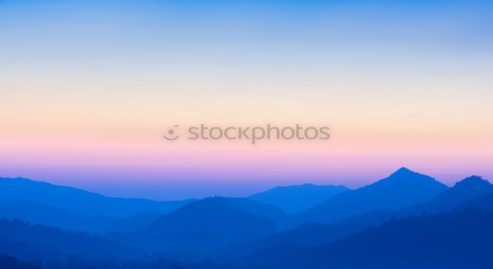 Similar – Berge im Licht Wolken