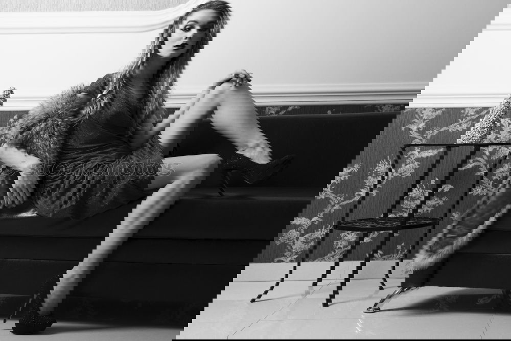 Similar – Image, Stock Photo sexy girl in leather pants sitting on the couch