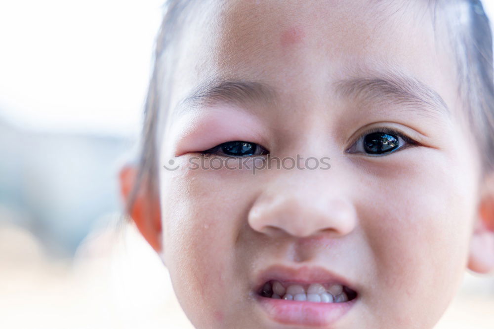 Similar – Close up face portrait little young asian boy