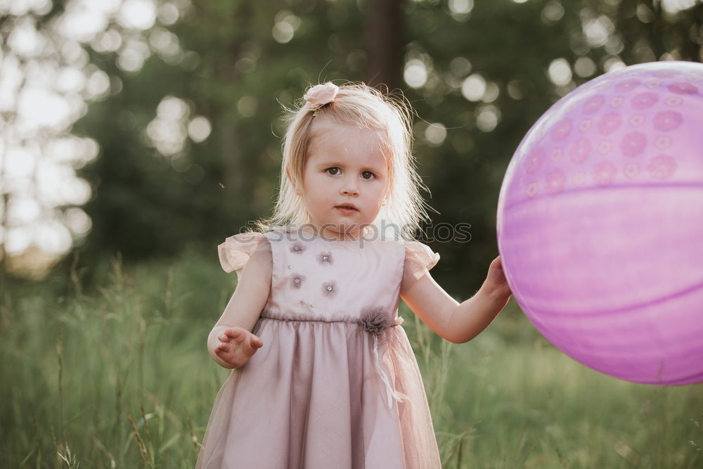 Similar – Little girl playing in a urban park