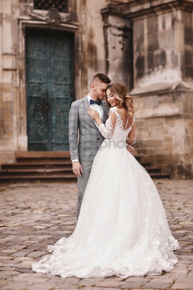 Similar – Newly married couple leaving the church.