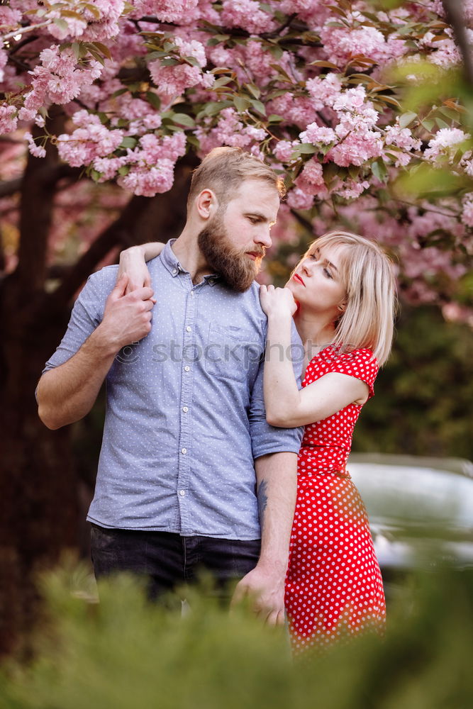 Similar – Image, Stock Photo Young smiling couple on a path in the park.