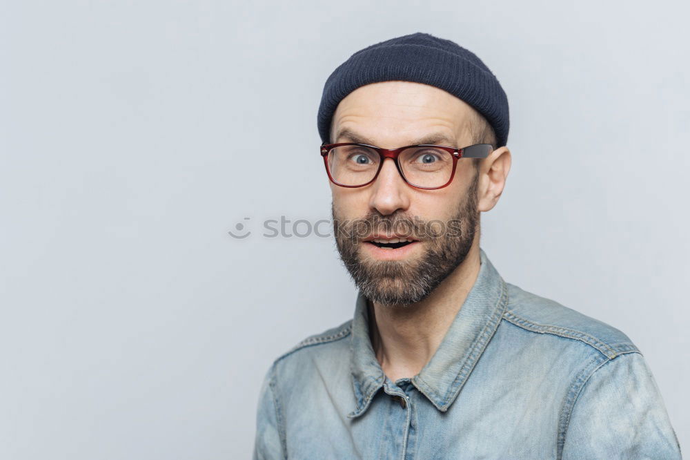 Similar – Image, Stock Photo Portrait of a man with mustache looking at camera.