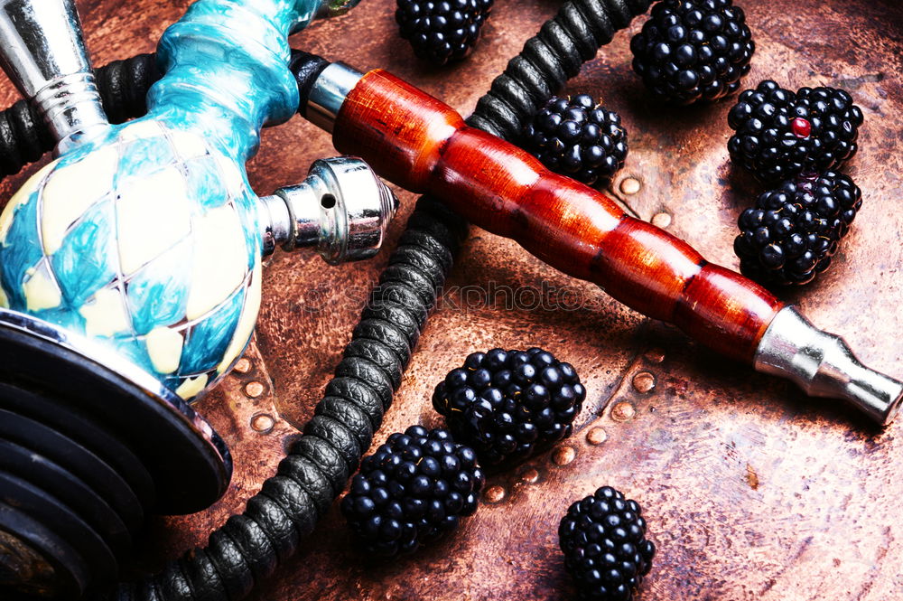 Similar – Stylish oriental shisha with blackberry