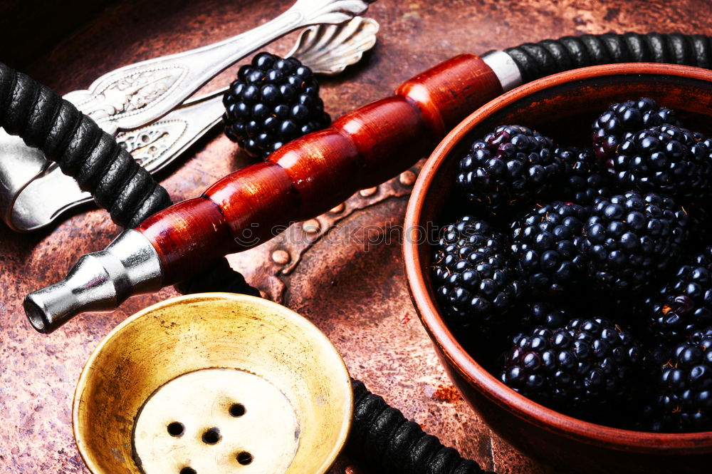 Similar – Stylish oriental shisha with blackberry