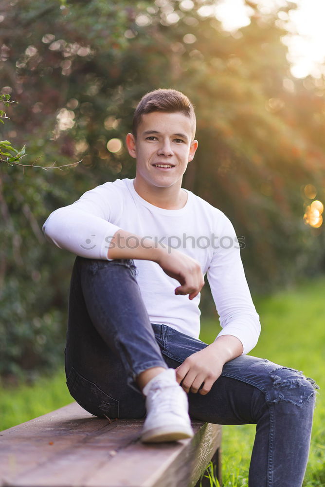 Similar – Attractive teenager guy in a park