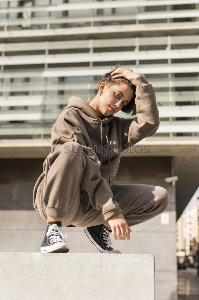 Similar – Image, Stock Photo Redhead teen woman alone in an urban place