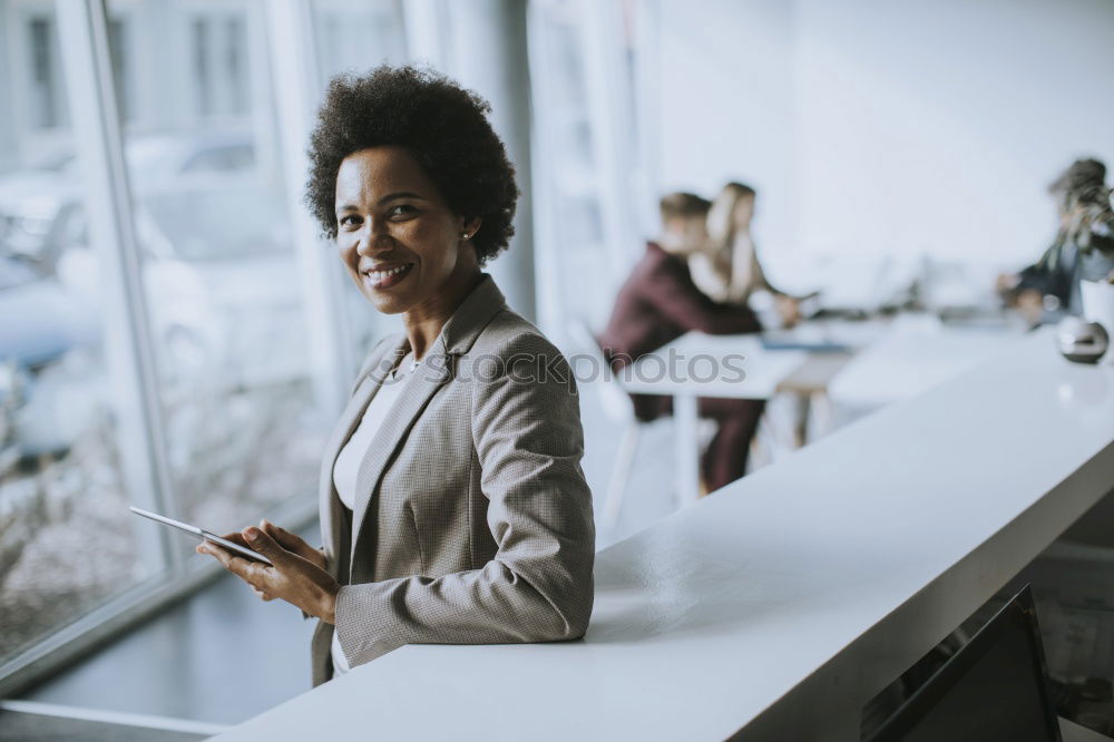 Similar – Black woman with afro hair drinking a coffee