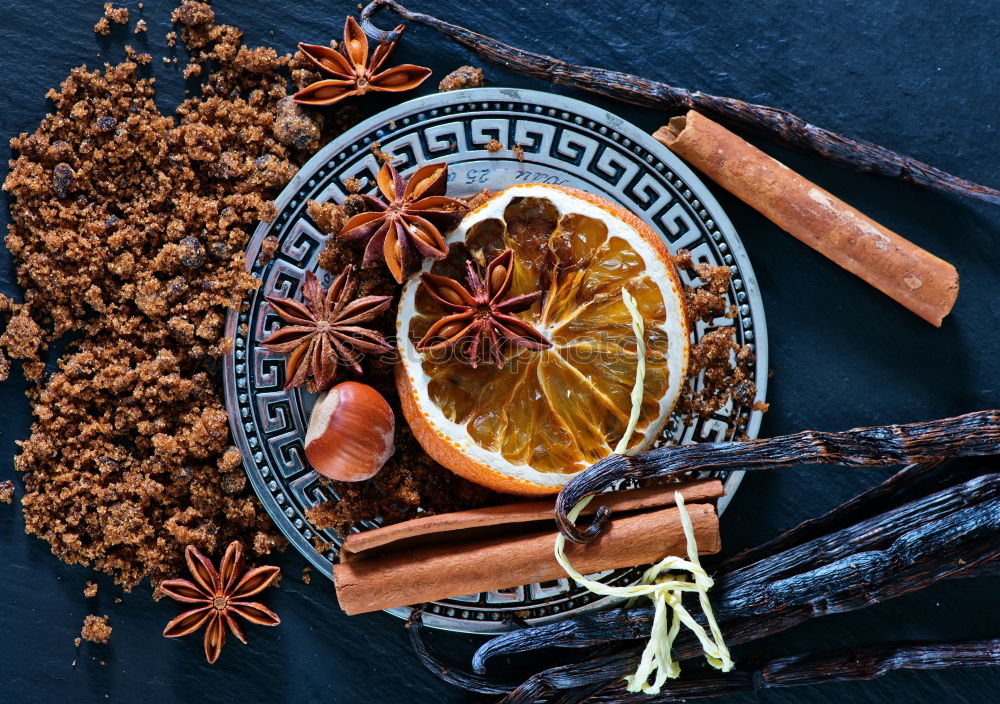 Similar – Mulled wine with dried fruits on winter decoration