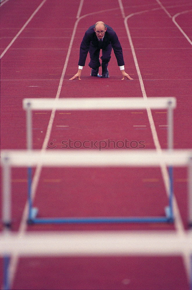 Similar – Image, Stock Photo Man jumping over hurdle