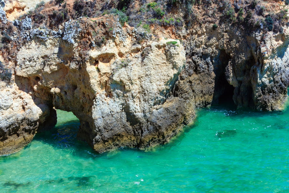 Similar – Ocean Landscape With Rocks And Cliffs At Lagos Bay Coast In Algarve, Portugal