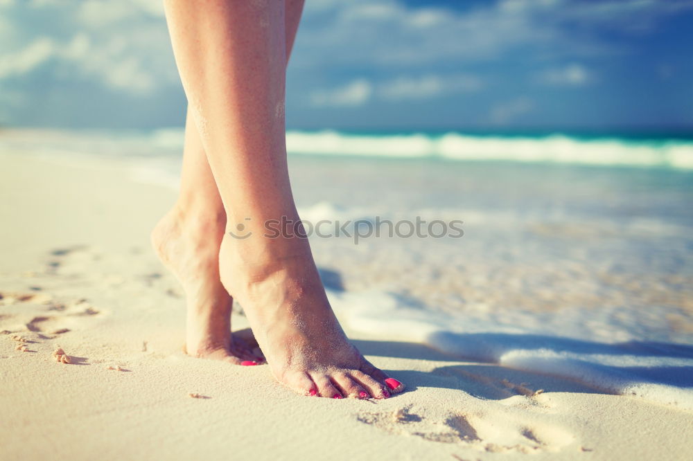 Similar – man takes a beach walk