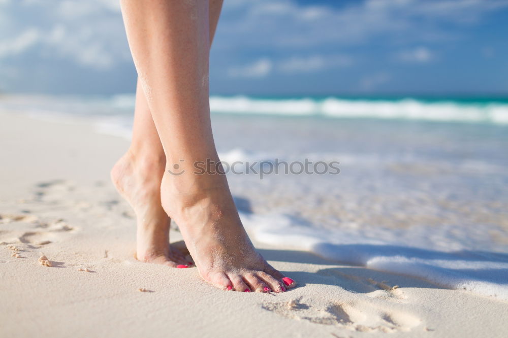 Similar – man takes a beach walk