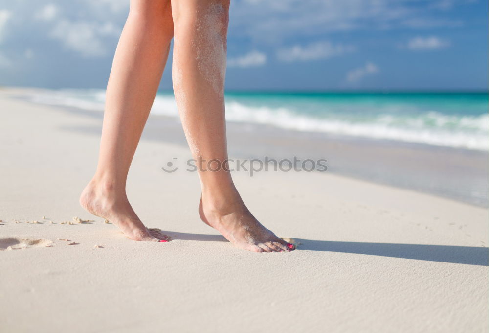 Similar – man takes a beach walk