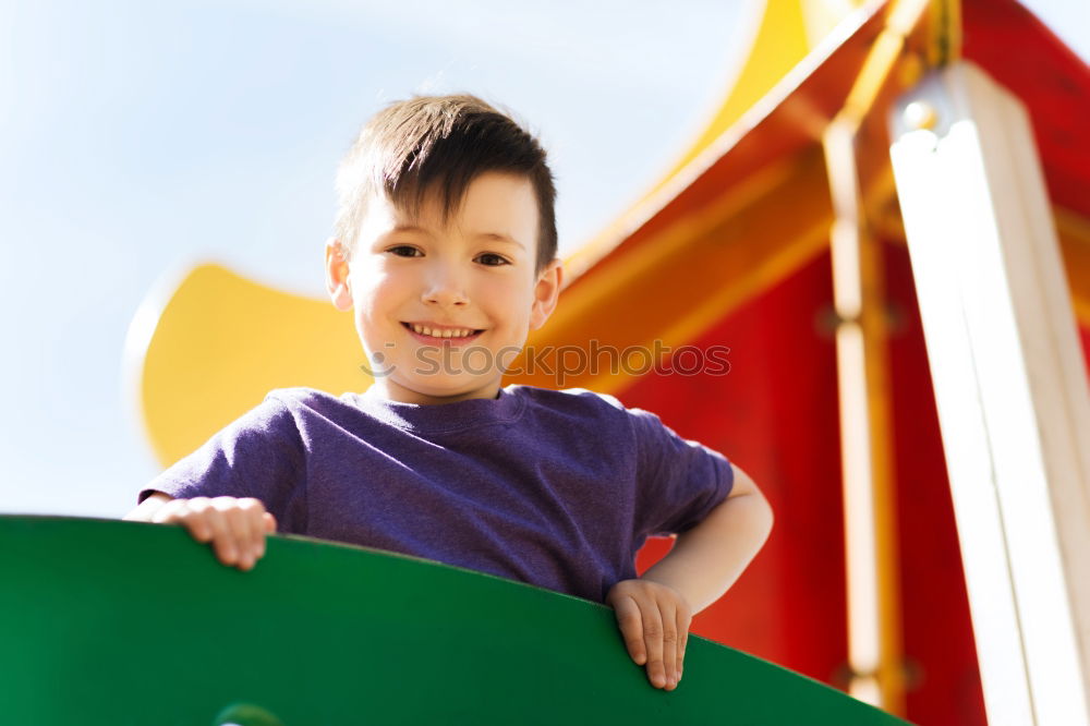 Similar – Child on a slide Joy