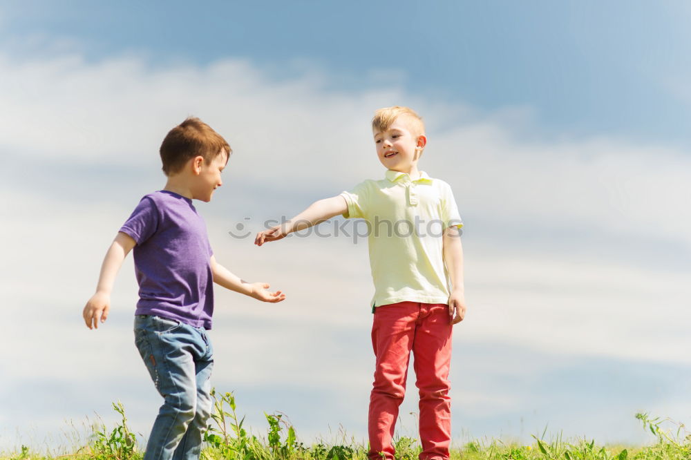 Similar – Father and son playing on the road at the day time.