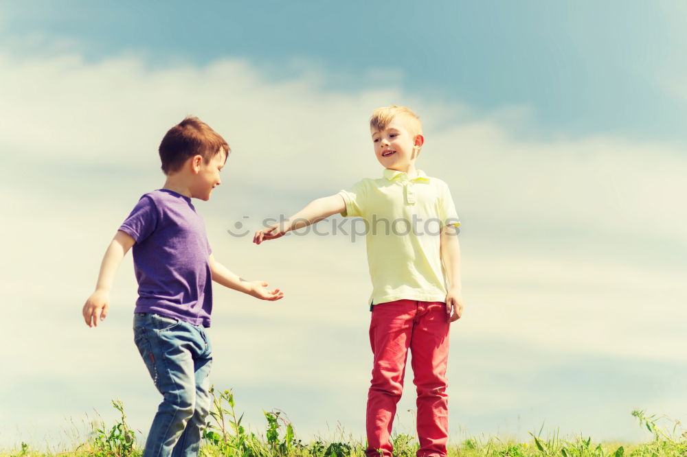 Similar – Brothers sitting at waterfront