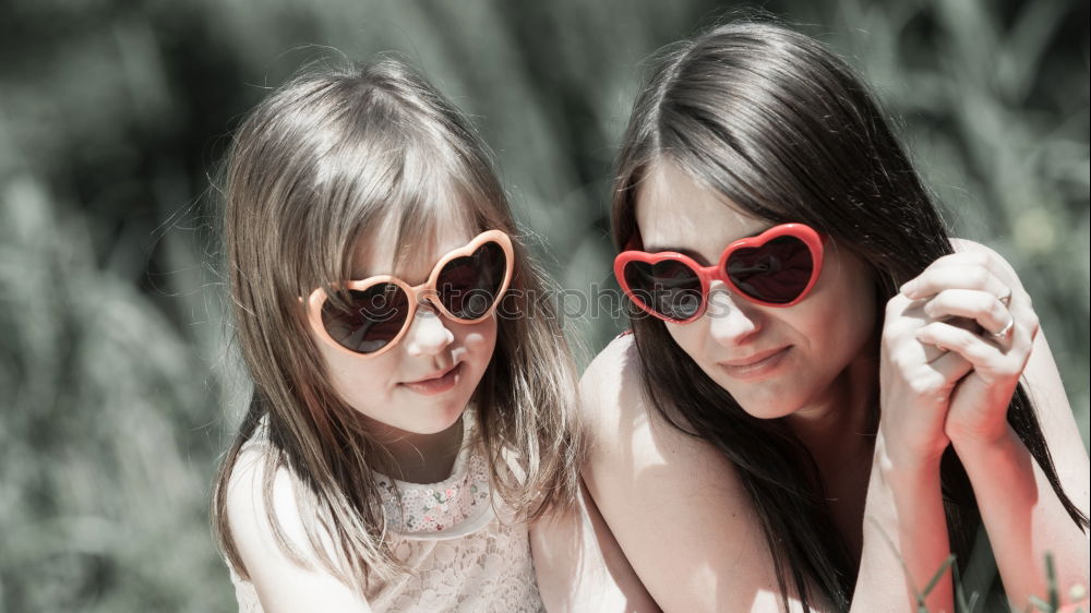 Similar – happy mother and daughter on the walk on summer